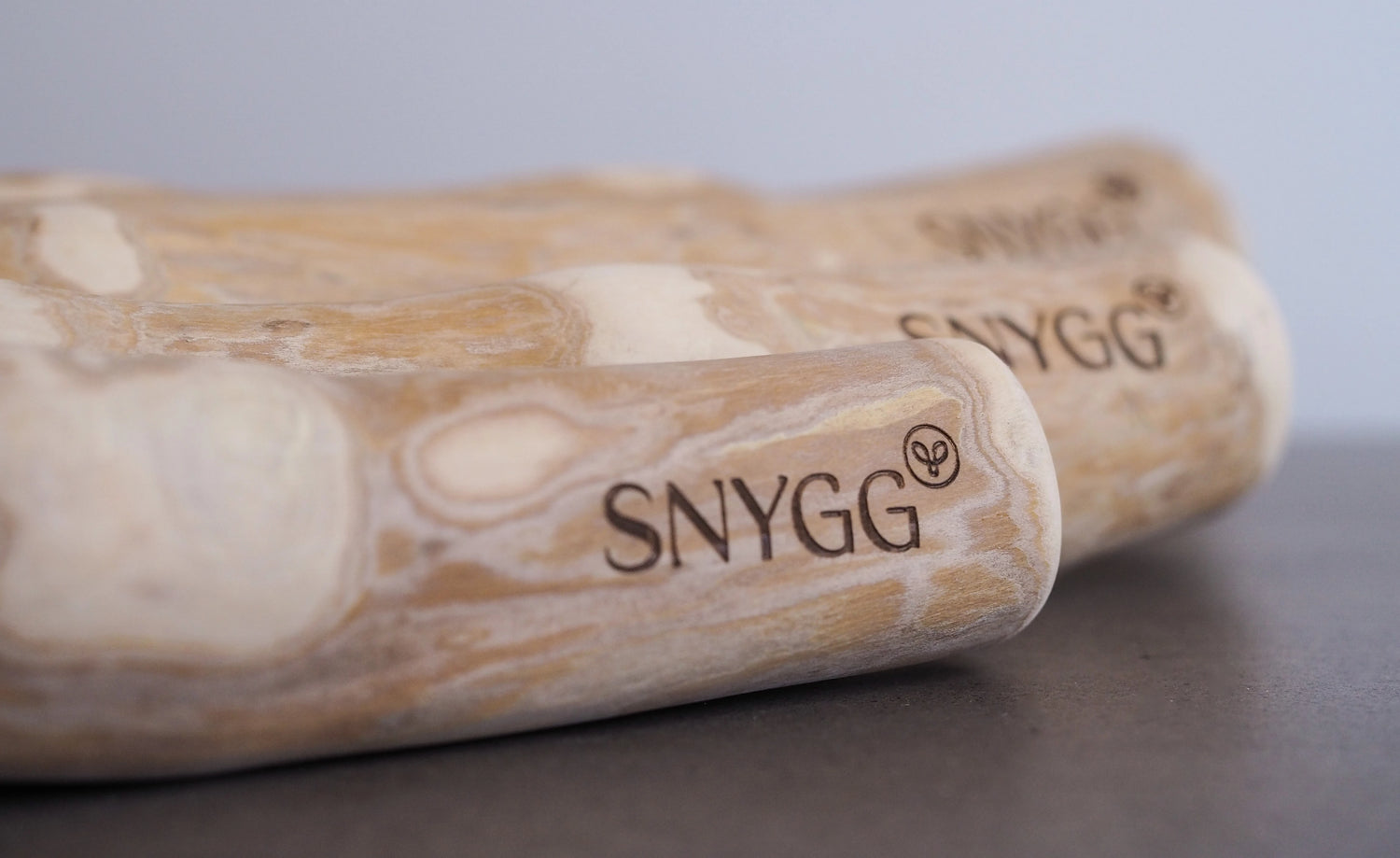 photo of SNYGG coffee wood chew stick with SNYGG logo